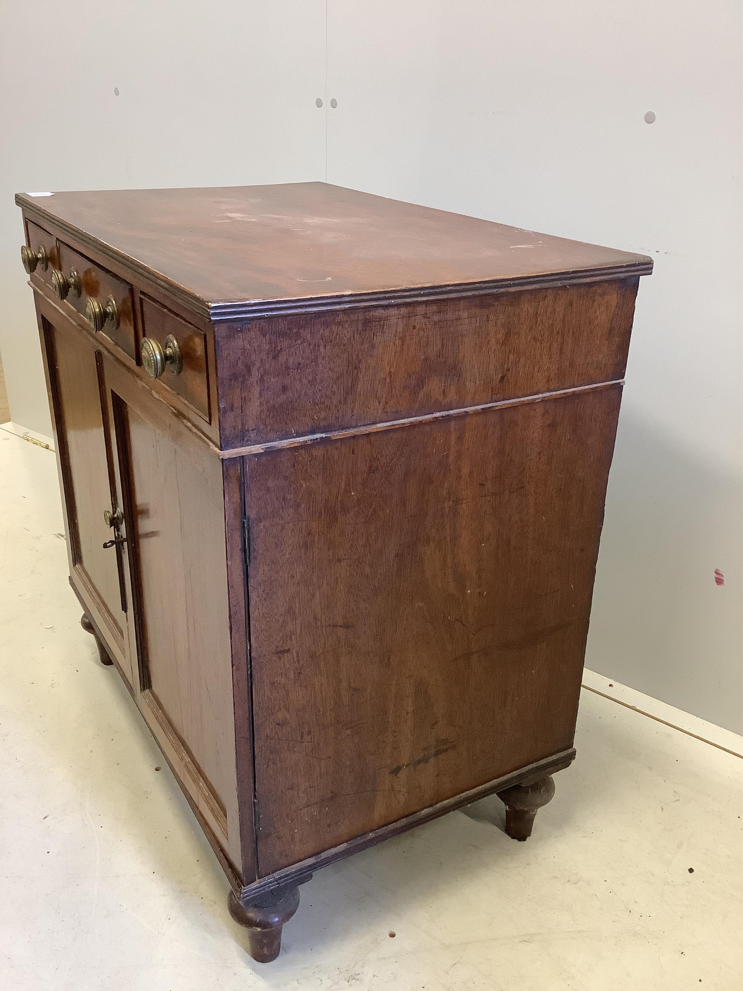 A small Regency mahogany side cabinet, width 74cm, depth 47cm, height 76cm. Condition - fair